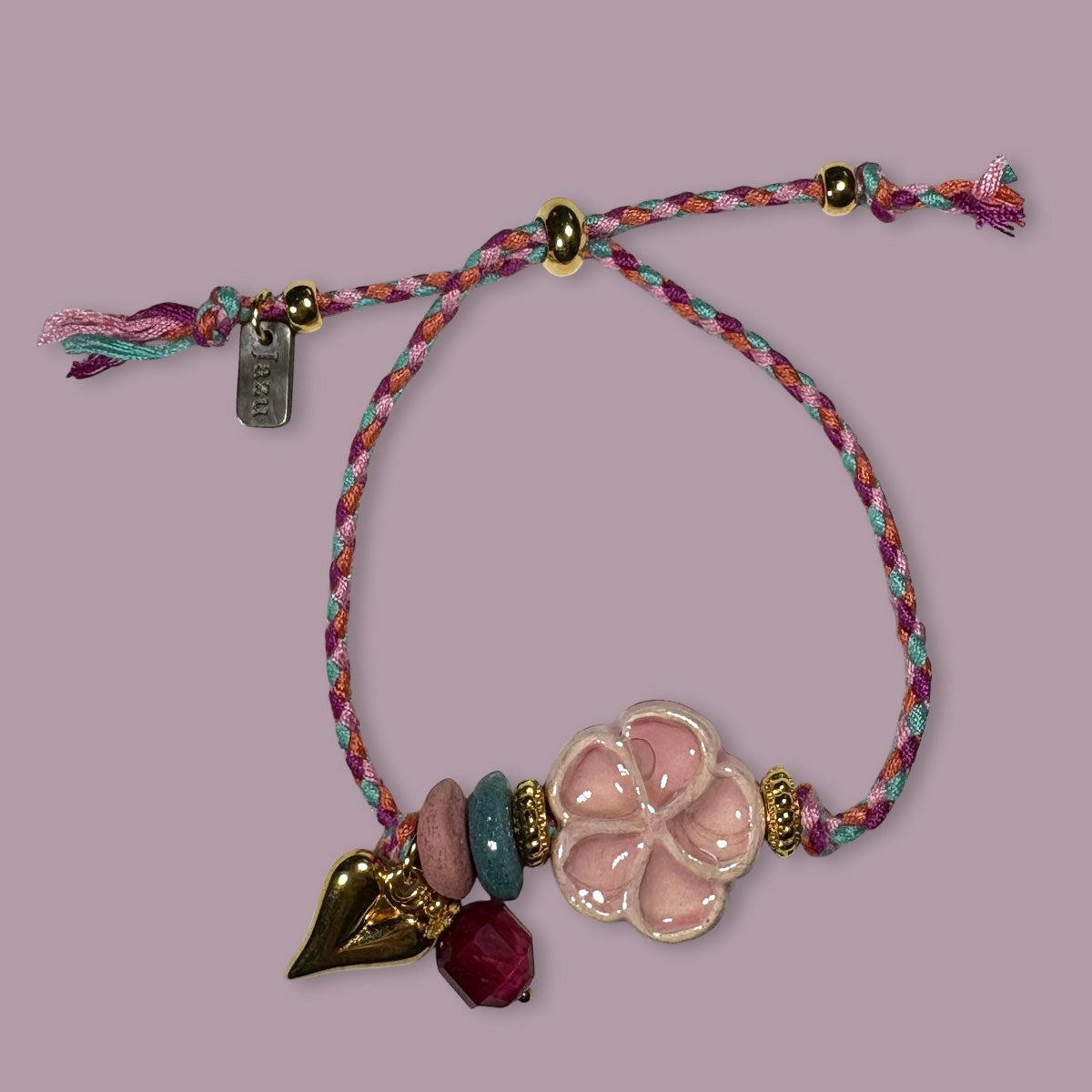 Unieke, handgemaakte armbandjes met keramieke bloem