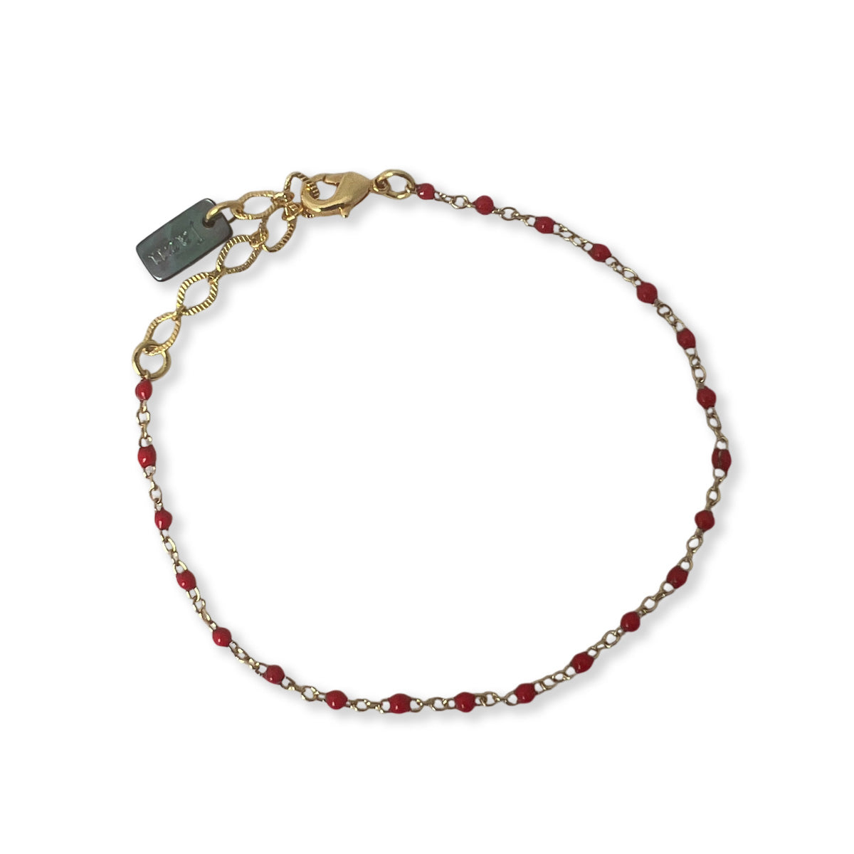 Armband met kleine gekleurde bolletjes van emaille