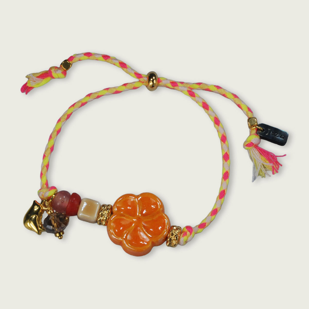 Unieke, handgemaakte armbandjes met keramieke bloem