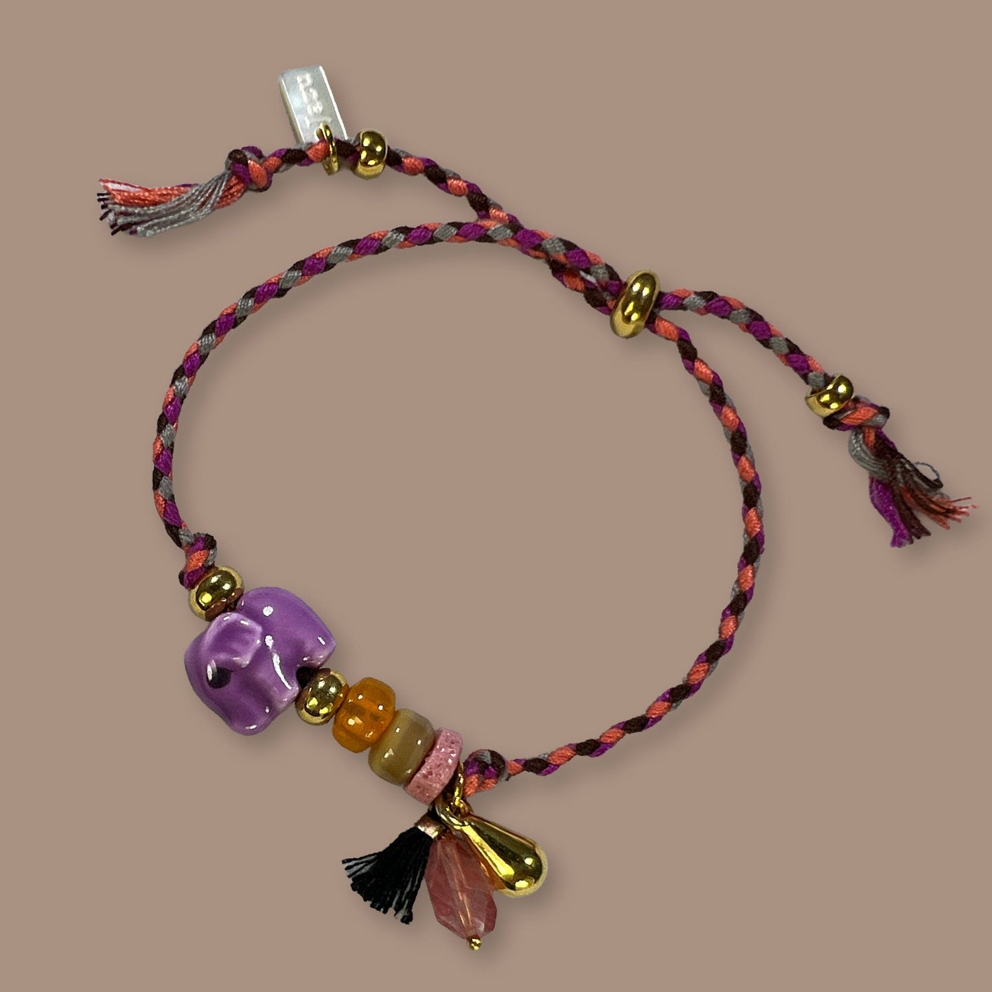 Unieke, handgemaakte armbandjes met keramieke olifant