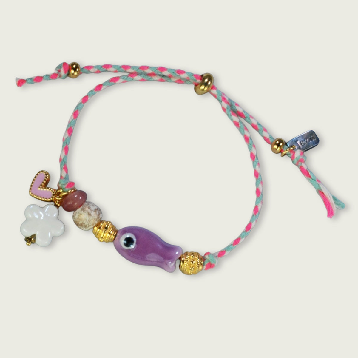 Unieke, handgemaakte armbandjes met keramiek visje