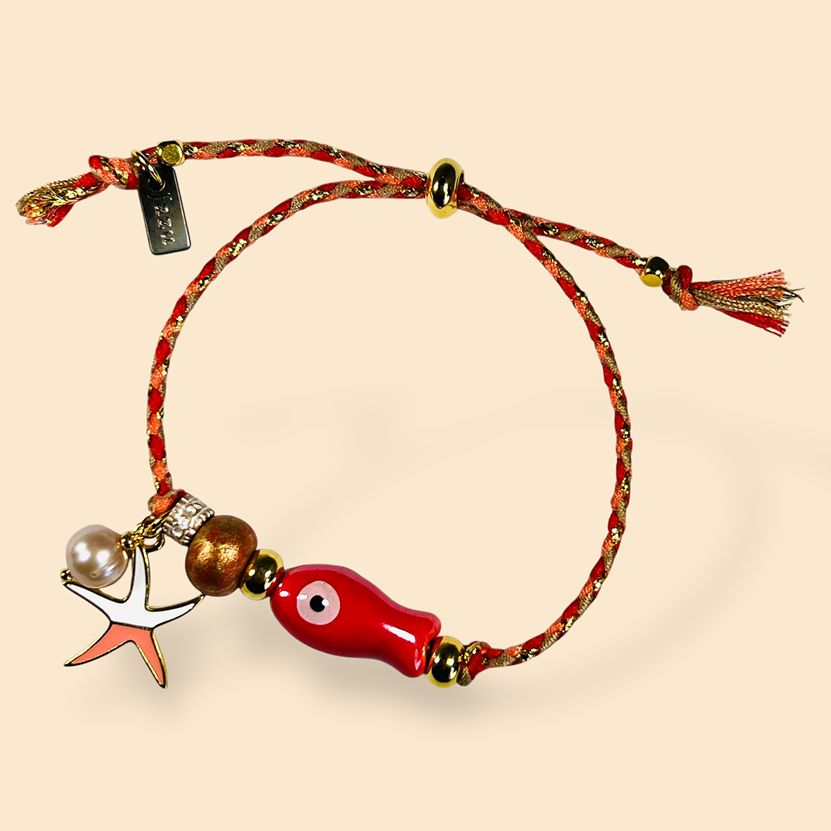 Unieke, handgemaakte armbandjes met keramiek visje