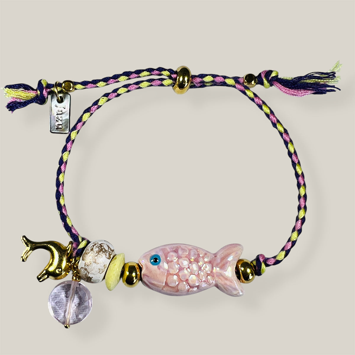 Unieke, handgemaakte armbandjes met keramiek visje