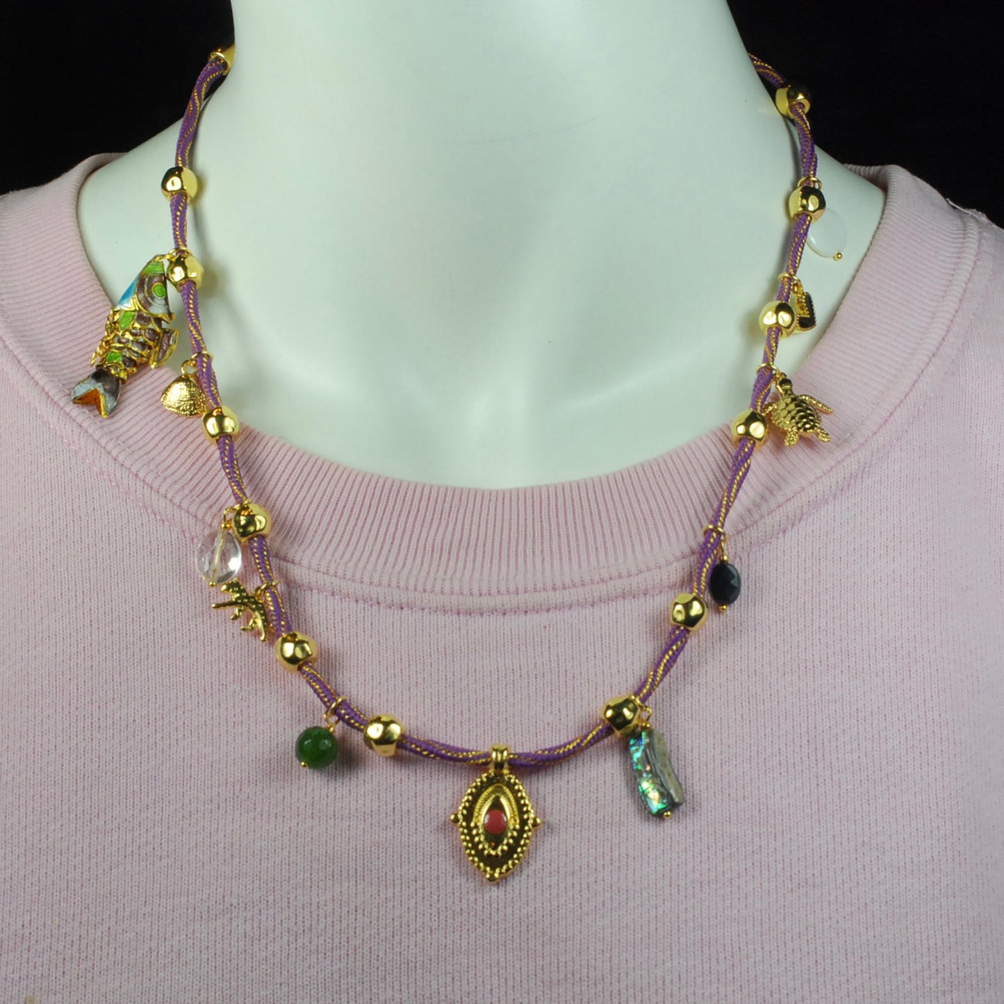 Charm ketting op dik koord