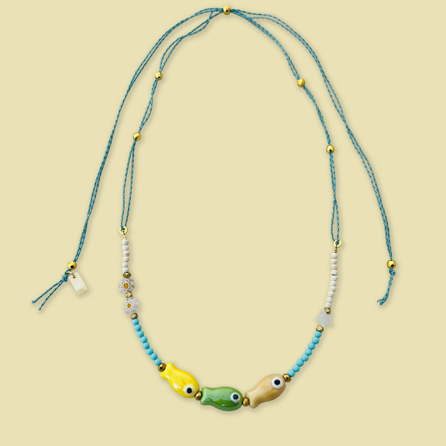 Verstelbare ketting met vissen