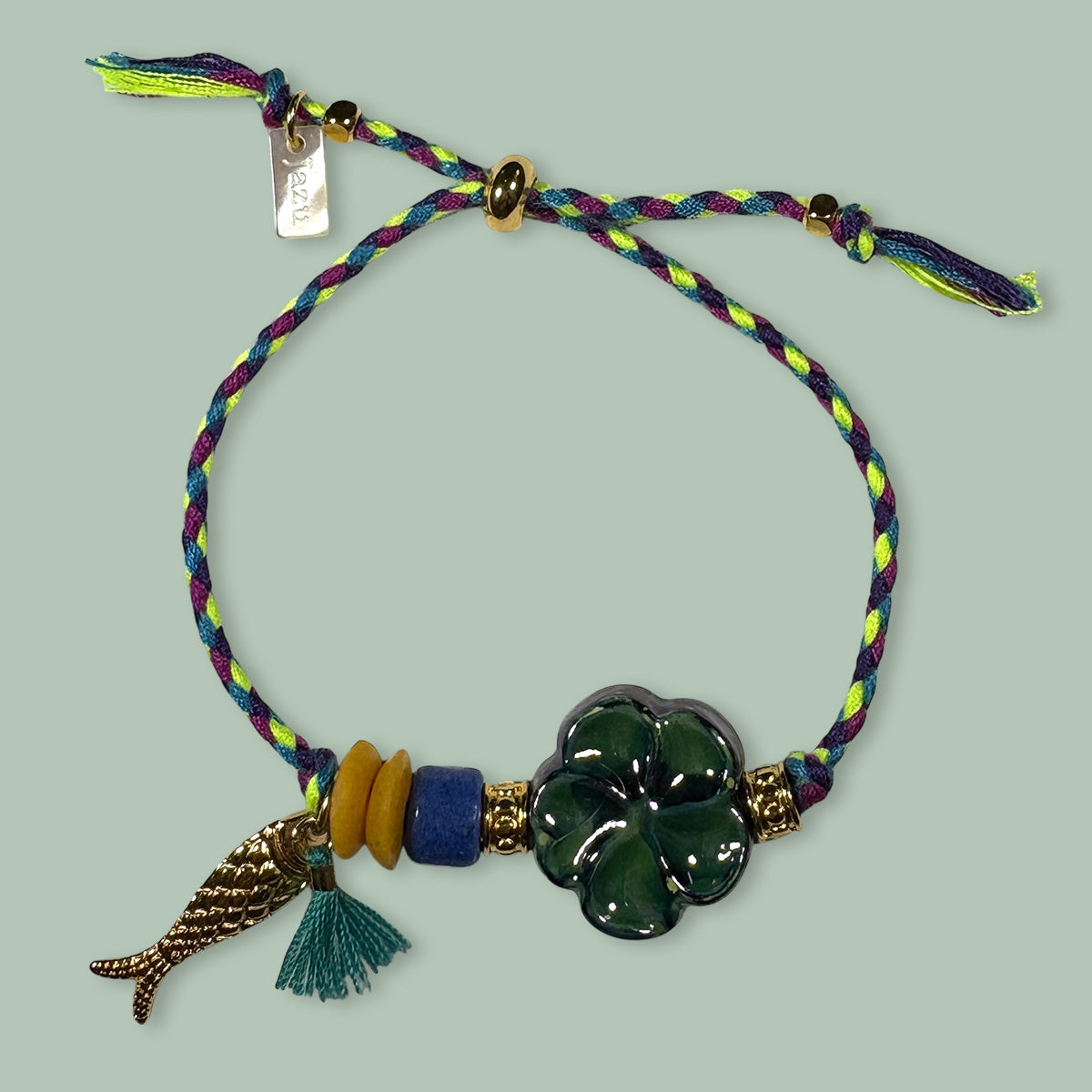 Unieke, handgemaakte armbandjes met keramieke bloem