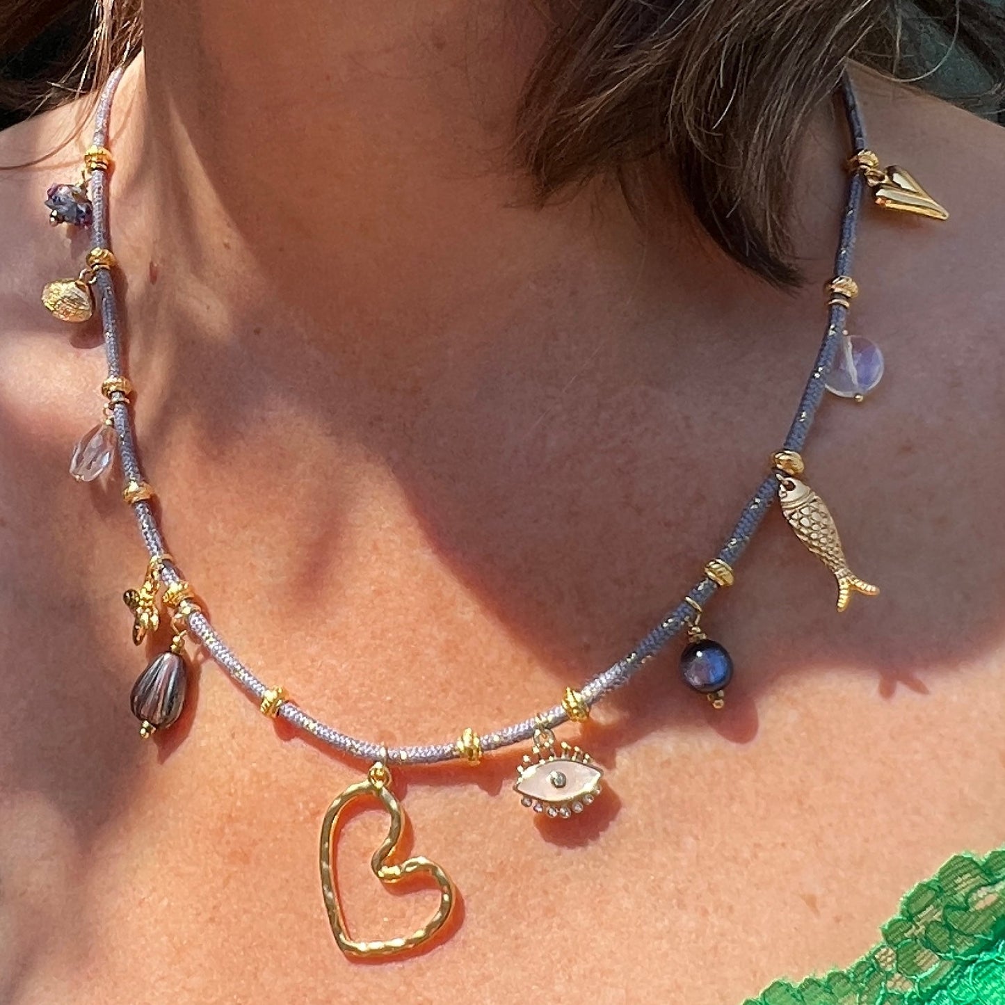 Charm ketting op dik koord