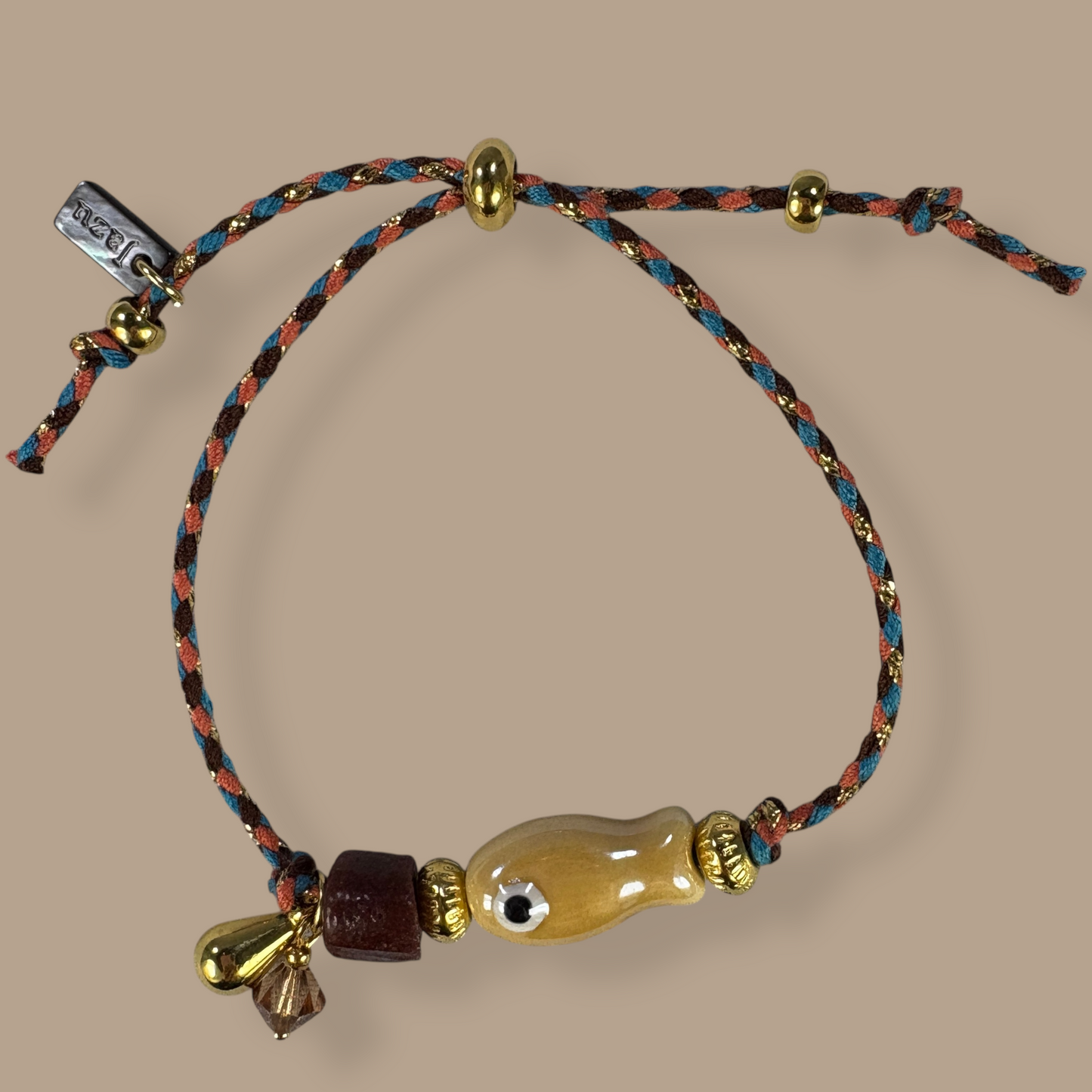 Unieke, handgemaakte armbandjes met keramiek visje