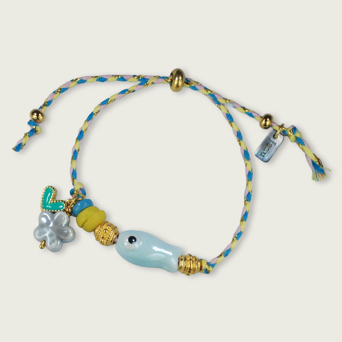 Unieke, handgemaakte armbandjes met keramiek visje