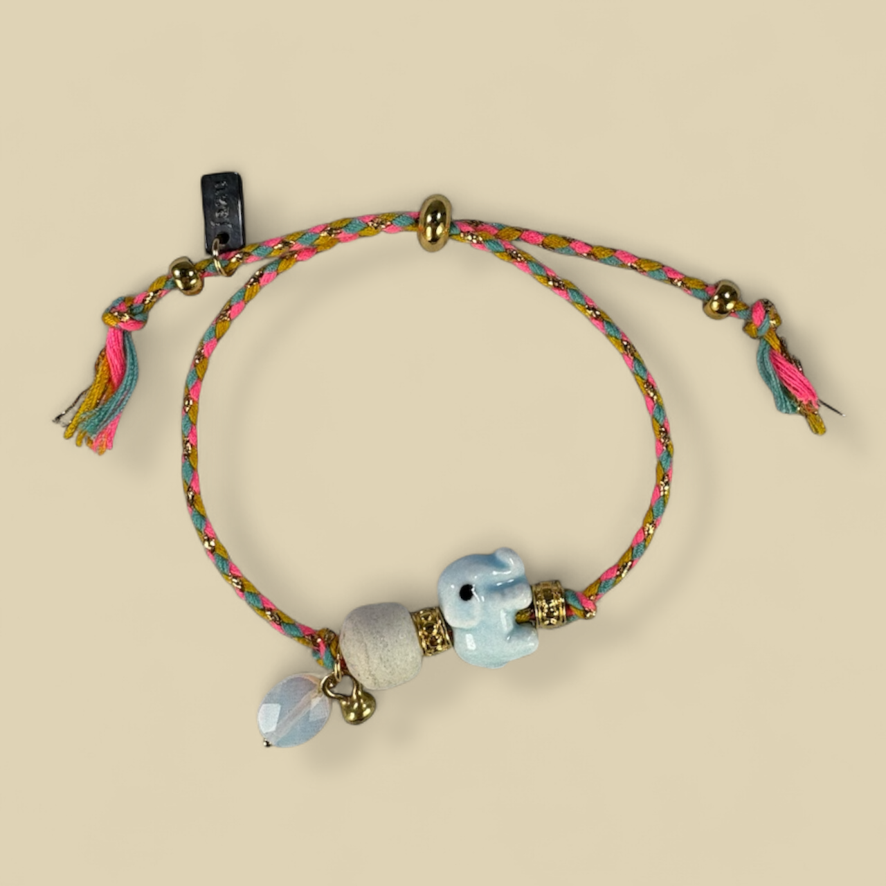 Unieke, handgemaakte armbandjes met keramieke olifant