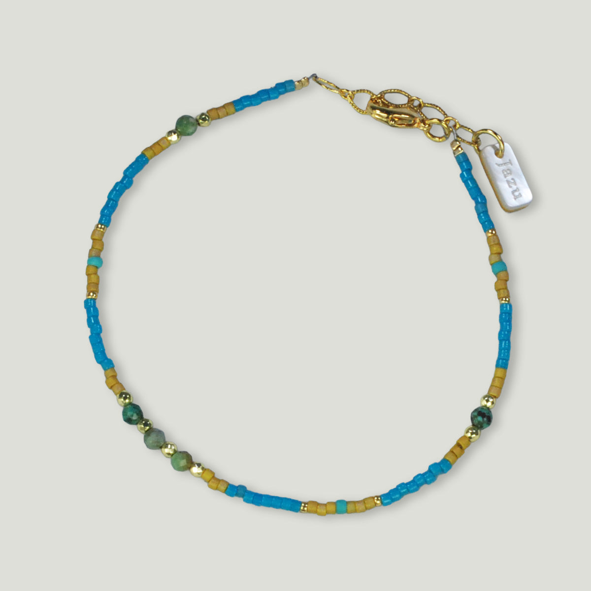 Winzige Farbarmbänder