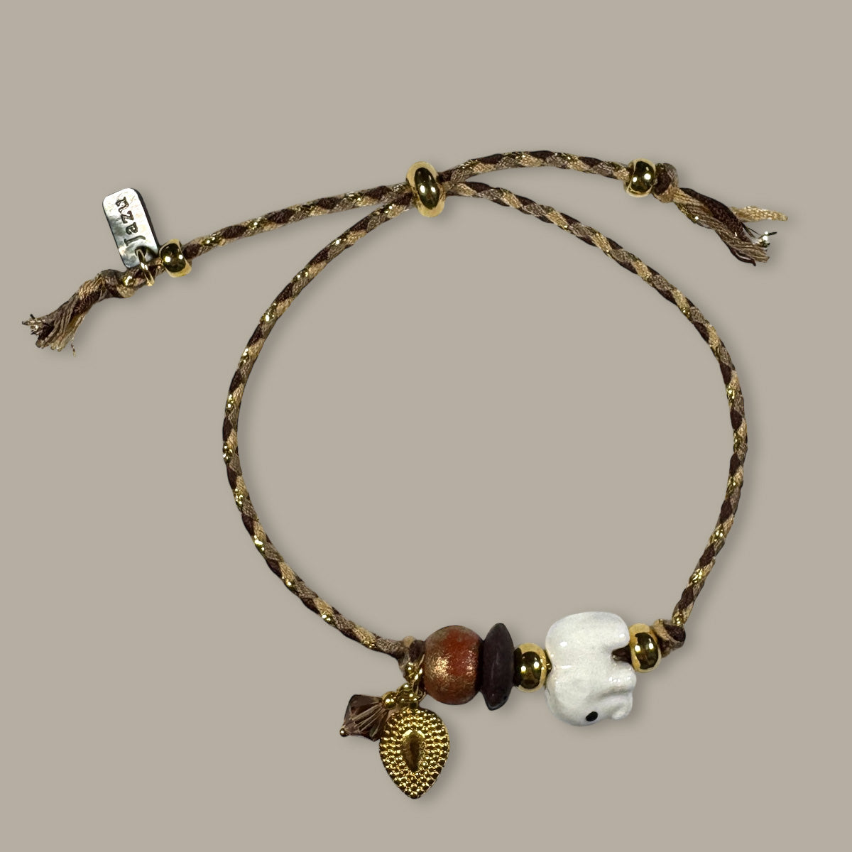 Unieke, handgemaakte armbandjes met keramieke olifant