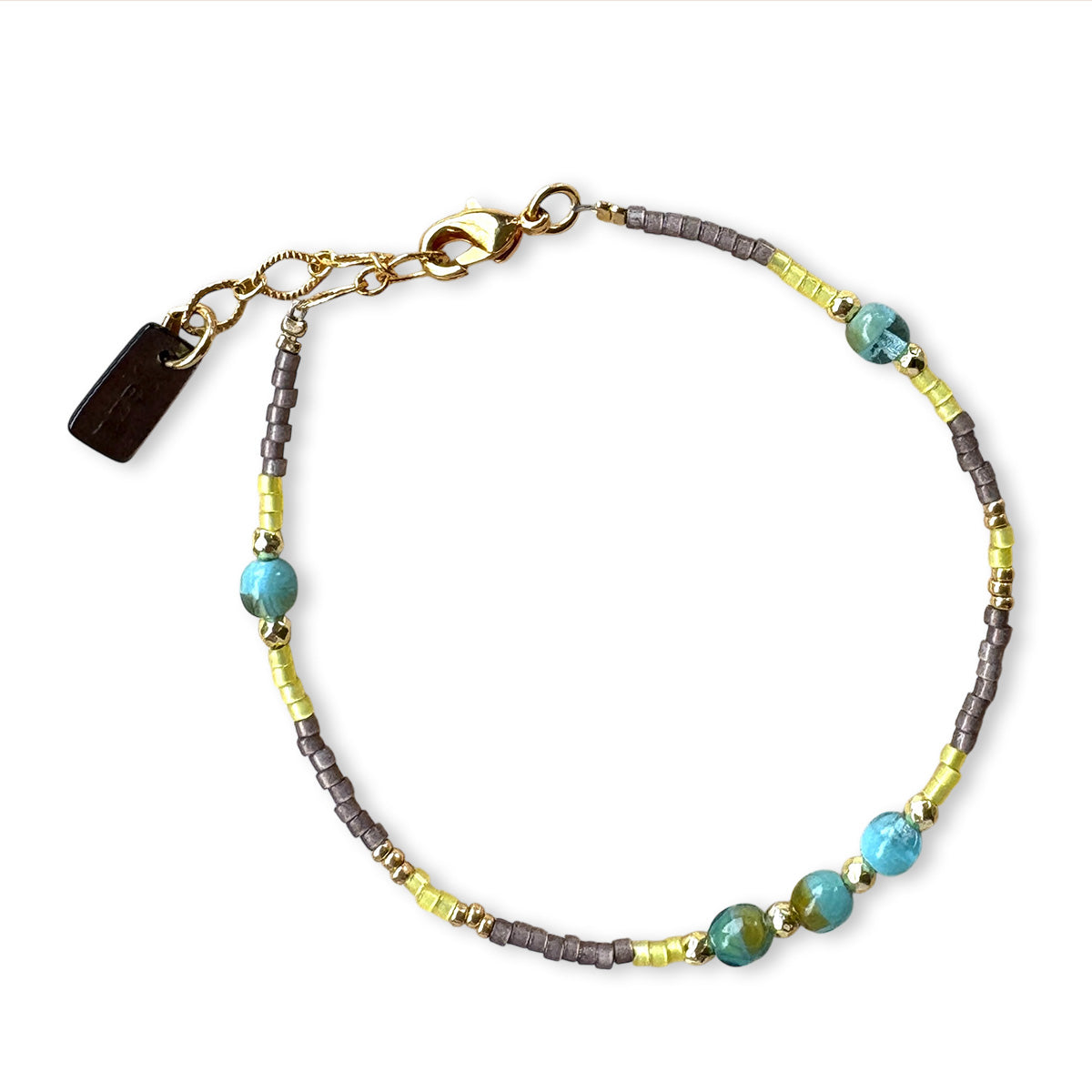 Winzige Farbarmbänder